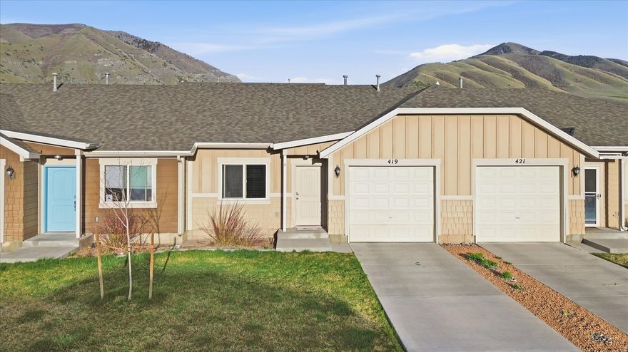 Welcome to one of the best values in Cache Valley! This charming single-level home in the highly sought-after Elk Mountain community offers comfort, convenience, and an unbeatable price point.  This 2 bedroom, 1 bathroom home is extremely well maintained, clean, and move-in ready. Features a 1 car garage and beautiful mountain views right outside your door.  You are just minutes from incredible outdoor recreation. Explore Blacksmith Fork Canyon for hiking, fishing, and scenic drives, or head to Hyrum State Park for boating and summer fun. Nearby trails like Elk Mountain Trail offer even more ways to enjoy the outdoors.  The Elk Mountain HOA provides low maintenance living with fantastic amenities including a community center, fitness center, pool, year-round hot tub, open green spaces, and parks and playgrounds.  Priced under $270K, it's sure to attract attention quickly, so be sure to schedule your showing today!