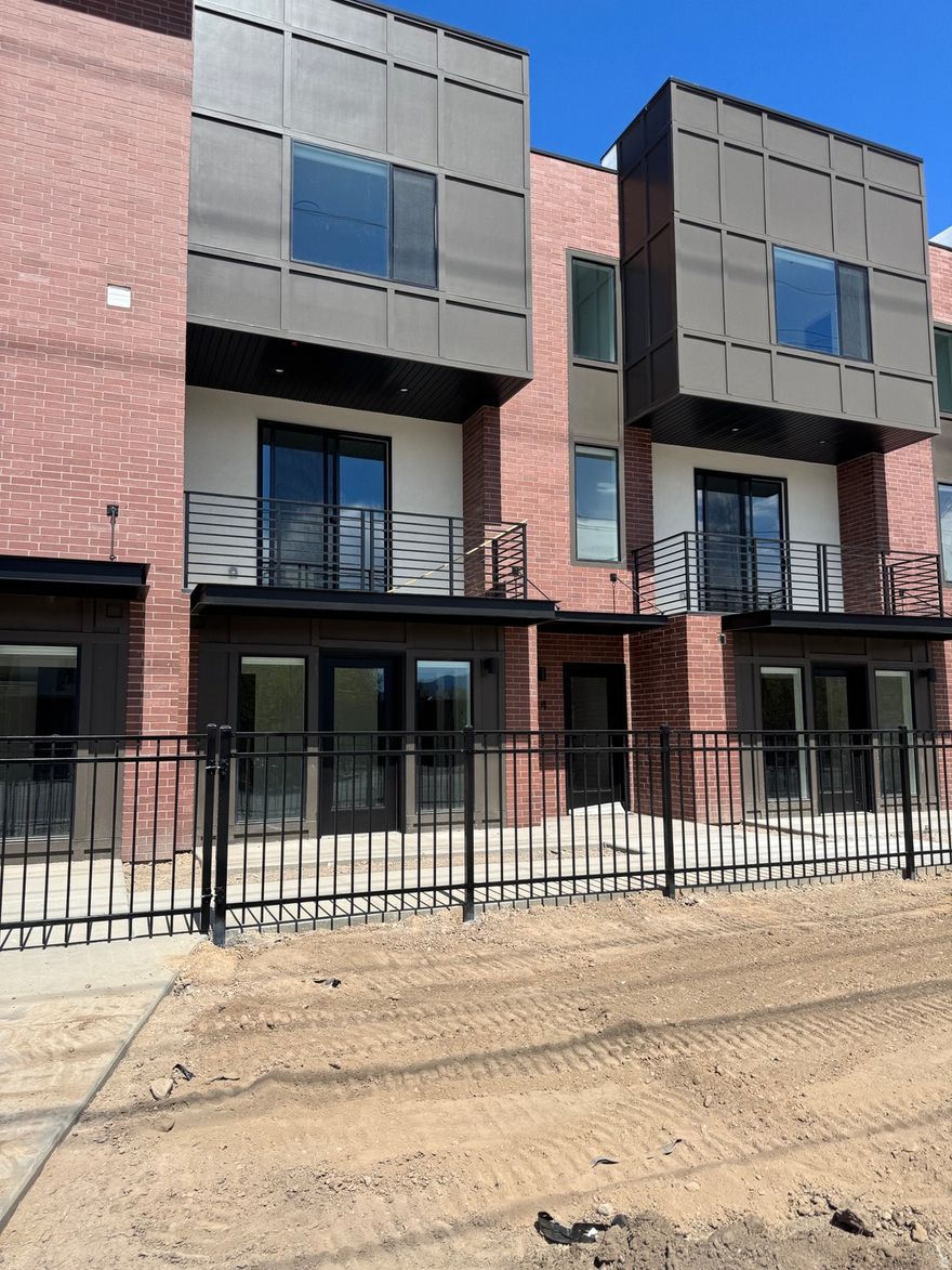 Modern living at theMONROE! This Type B2 interior townhome is currently under construction with an estimated completion at the end of May - perfect timing to secure a brand-new home in one of Salt Lake's most desirable communities. This thoughtfully designed floorplan offers 3 bedrooms, 3 bathrooms, and a 2-car garage, with a bright, open-concept main level that seamlessly connects the kitchen, dining, and living areas. A private balcony extends your living space, creating the perfect spot to relax or entertain. The home will feature designer-selected finishes throughout, including quartz countertops, modern cabinetry, stylish lighting, and durable flooring, all curated to create a clean, contemporary feel. Enjoy low-maintenance living with convenient access to downtown Salt Lake City, shopping, dining, and major commuter routes. Community amenities include a pickleball court and nearby green space, offering both lifestyle and location. Photos are of previously built unit; finishes and selections may vary.