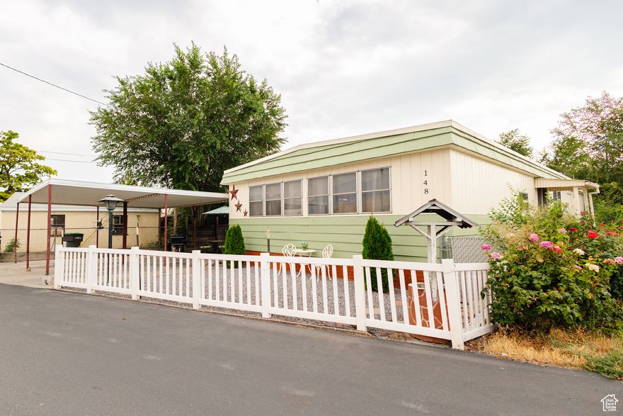 Looking for a property that offers both comfort and unbeatable convenience? This well-maintained manufactured home is located just steps from I-15, making your daily commute, errands, and access to nearby towns, cities, Universities, incredibly easy. Whether you're a first-time buyer, downsizing, or looking for an investment property with high rental potential, this location is hard to beat! Set on a spacious lot with plenty of parking, this home offers privacy and easy access to major services and transportation routes. The surrounding area is peaceful, yet close to shopping, dining, schools, parks, and more. With easy highway access, you'll save time every day while enjoying the benefits of a tranquil residential setting. The home itself features a functional layout, generous square footage, and an inviting living space. Depending on the setup, you could enjoy multiple bedrooms, a full kitchen, laundry space, and even a small yard or deck for outdoor enjoyment. Don't miss this rare chance to own a manufactured home with direct highway access, ideal for truckers, commuters, or anyone needing fast mobility. Contact us today to schedule your private tour!
