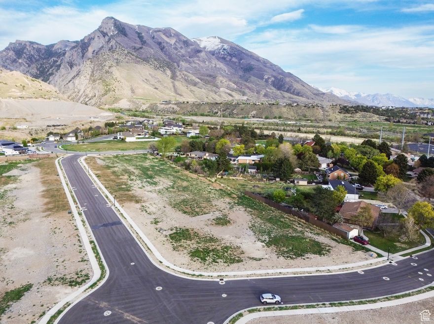 Stunning 0.88-Acre Lot in Highland, Utah! Enjoy panoramic mountain vistas and quick access to outdoor recreation in American Fork Canyon, top-tier golf courses, and high-end outlet shopping. Design and build your custom home in a location that blends natural beauty with refined living-this is elevated mountain life at its finest.  Claim your corner of luxury today!  This address/road is currently being registered with mapping services. Please enter the following address into the map to locate available lots: 11118 N Mill Iron Cir, Highland, UT 84003.