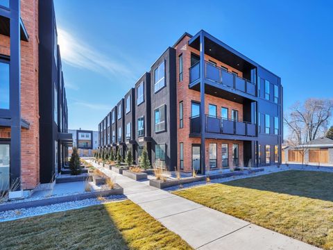 Photo of 884 E ROWLEY DR #101, Millcreek, UT 84107 (MLS # 2147780)