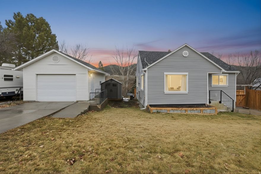 This charming  starter home in Malad City is perfect for first-time buyers-updated, affordable, and move-in ready for creating lasting memories. Fresh updates shine throughout: new flooring, paint, sparkling kitchen and baths, plus a cozy living room with a fireplace ideal for chilly Idaho nights. No big repairs needed-the roof and siding are newer, and a brand-new high-efficiency furnace and A/C keep bills low.  The extra-large garage offers space for cars, bikes, tools, or a workshop. Four spacious bedrooms provide room for kids, an office, or guests. Tired of scrolling listings? This low-maintenance gem in a friendly neighborhood lets you own, not rent. You'll love it at first sight!