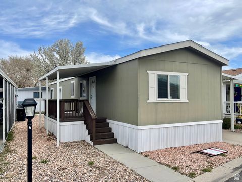Photo of 4713 PASQUE DR DR #360, Taylorsville, UT 84123 (MLS # 2064643)