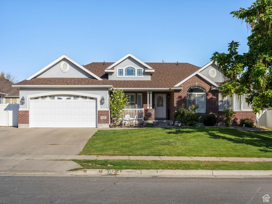 This spacious Clearfield rambler offers nearly 4,000 sq. ft. of living space with 6 bedrooms, 4 bathrooms, and an inviting open floor plan. The main level features vaulted ceilings, a large kitchen and dining area ideal for entertaining, and the convenience of single-level living if desired. The finished basement includes a kitchenette with a generous pantry, a spacious family/game room, and ample storage. Recent updates include a newer roof, water heater, basement carpet, a remodeled shower and soaker tub in the primary suite, and a brand-new composite deck. Outside, the fully fenced and landscaped yard is the perfect place for kids to play, pets to run, and to host summer get-togethers. Additional highlights include a two-car garage, extra parking for a trailer or additional vehicles, and a storage shed. Located just off Antelope Dr. in the desirable Chrissam Meadows neighborhood, this home is close to parks, schools, shopping, Hill Air Force Base, and freeway access. Don't miss this incredible opportunity to make this one yours. Schedule your showing today!