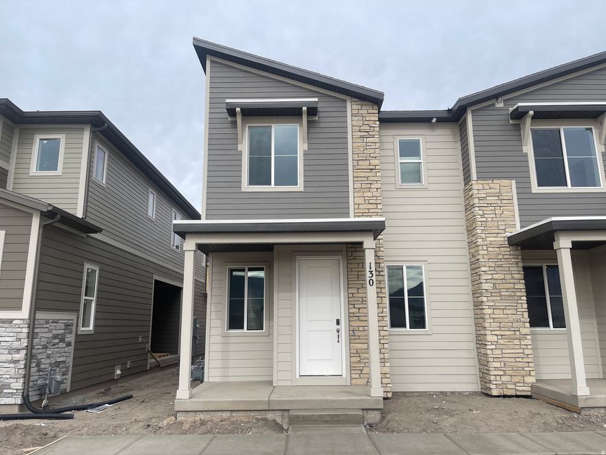 LIMITED-TIME BUILDER INCENTIVE! Qualify for a rate as low as 3.99% fixed 30yr rate on FHA/VA loan. Contract by 12/07/25 CLOSE by 12/31/25 Restrictions apply: Contact us for more information *** The Chicago plan greets guests with a charming, covered porch and continues to impress with an open kitchen featuring a pantry, center island and adjacent dining room. The main floor also offers a powder room, an inviting living room, a covered patio with center-meet sliding glass doors, and a 2-car garage. Upstairs you'll find a convenient laundry and three generous bedrooms, including a primary suite with a walk-in closet and private bath. Designer curated finishes complete this semi-luxury home with quartz countertops throughout home and LVP flooring on main areas. Current pictures are from a model home and are not exact representations of the home's interior and exterior design. Buyer to verify square footage.