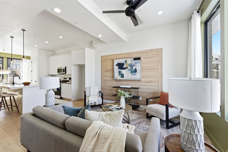 Last few new construction units remaining. Step into this thoughtfully designed 3-bedroom, 3.5-bath townhouse offering breathtaking views of the Salt Lake Valley and modern-day comfort throughout. Large windows invite abundant natural light into the home, enhancing the open and airy feel of each space. The kitchen connects effortlessly to the main living and dining areas, creating an ideal layout for both relaxed daily living and hosting gatherings.   The property includes a one-car garage plus an additional driveway parking spot for added convenience. The spacious primary suite serves as a private retreat, featuring its own en-suite bath and generous closet space. Two additional bedrooms, each with access to full bathrooms, offer flexibility for guests, family members, or a dedicated home office.  Located just moments from outdoor adventures, shopping centers, restaurants, and easy freeway access, this home delivers comfort, quality, and convenience in one of the valley's desirable areas. Enjoy stylish living with scenic surroundings in this exceptional Salt Lake Valley townhouse.