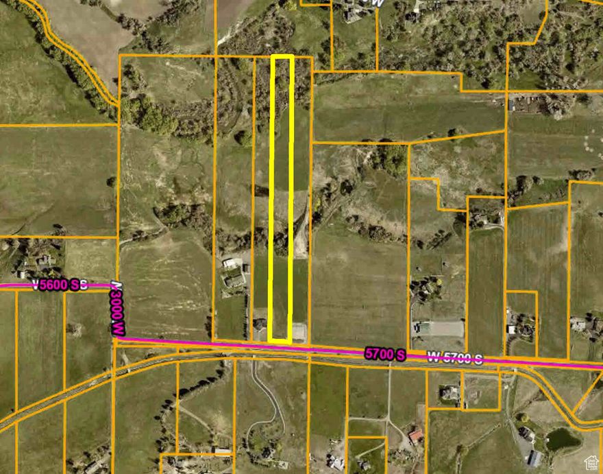 HUGE PRICE REDUCTION. 5.92 acre secluded lot with well permit and river frontage. Unique property with excellent views of Cache Valley. Wildlife galore. Pressurized irrigation.