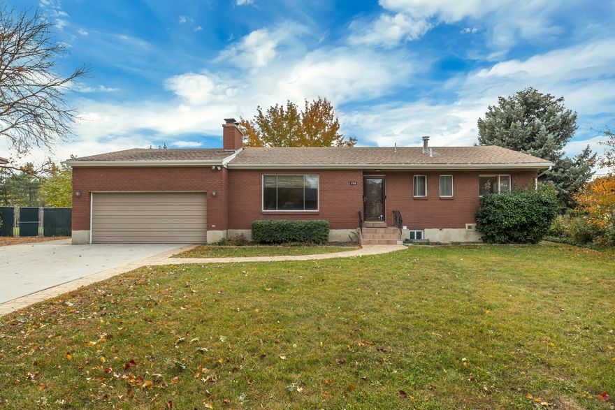 This all-brick rambler, lovingly cared for by one family since 1958, sits on nearly  acre in a highly desirable Holladay neighborhood. The spacious lot includes a fully automated sprinkler system and mature landscaping. Inside, bring your vision-just add new carpet and fresh paint to make it your own!  Upstairs has original hardwood floors under the carpet. Don't miss this rare opportunity to own a piece of Holladay charm.