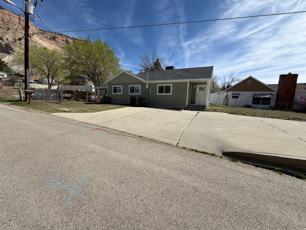 Photo of 210 RIDGEWAY ST, Helper, UT 84526 (MLS # 2146385)