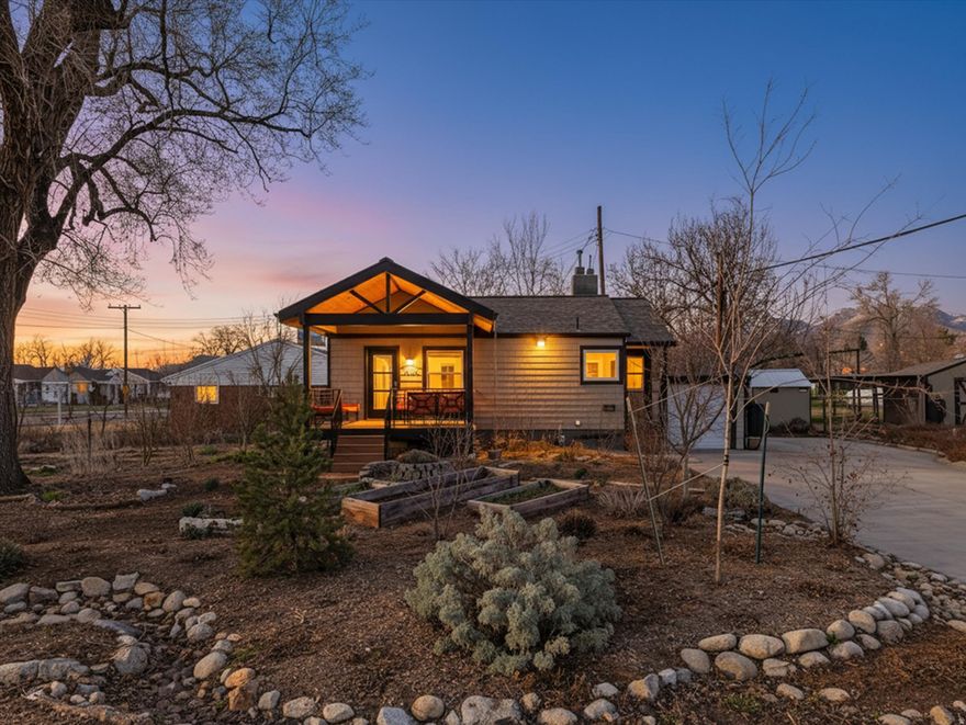 Welcome to this charming bungalow in the desirable Highland Park neighborhood!  An urban homesteader's dream on a corner lot filled with fruit trees and shrubs, a vegetable garden, raised beds as well as a chicken coop and pollinator plants. Walking through the spacious garden, one enters the home from a large covered porch, perfect for entertaining or relaxing. The light-filled main living room flows into the open kitchen, great for gathering with friends. The main floor includes the primary bedroom, primary bath, pantry and back entry/mudroom. Downstairs there are two additional bedrooms, a large  bath, laundry and storage. This home boasts many features and upgrades, including a garage, an electric vehicle charger, newer roof, newer HVAC system with heat pump, high-efficiency water heater, and drip irrigation for the garden. You will enjoy being just minutes from top-rated schools, local parks, entertainment, dining and grocery stores, as well as easy freeway access to downtown or the canyons.