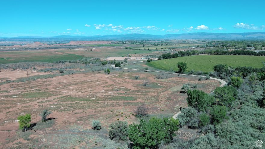 Incredible Hwy. 40 Frontage on Hilltop directly east of the Old Hilltop Bar, great visibility and at an affordable price. Property could be subdivided into 2 sections with business on Hwy 40 and plenty of room further back (North) for a future home. There is 3 phase power that is run down the west side of the land. This property is on Greenbelt with no water shares attached but there could be options for drilling a well or transferring shares if applicable. Buyer to look into water options for this land.
