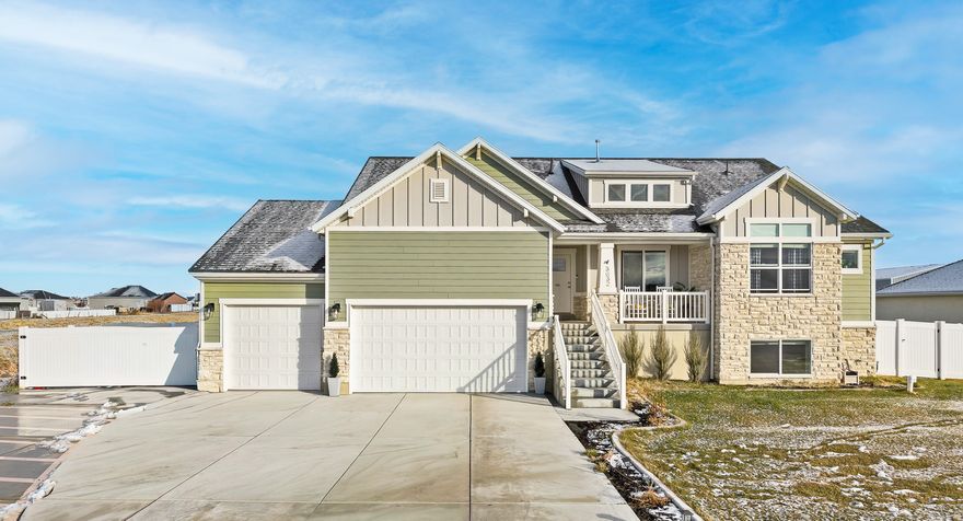 You are looking at a fully finished 6-bedroom and 3-bathroom home situated on a rare half-acre lot in Hooper, Utah. This fantastic property offers spacious main-level living with a gourmet kitchen, vaulted ceilings, LED lighting, and an oversized garage with a massive concrete driveway/RV pad for all your toys. The yard is fully landscaped and fenced with automatic sprinklers throughout. Conveniently located just 10 minutes from HAFB and Northrop Grumman, and within 30 minutes of world-class skiing, fishing, and scenic walking & biking trails, and only 40 minutes from Salt Lake International Airport. With so many features, a turnkey, Move-in-Ready Home like this one is hard to find. Schedule your private tour today, you'll be glad you did!