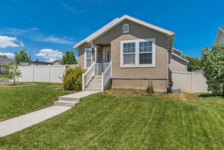 Don't miss this charming Saratoga Springs gem! Ideally located near neighborhood parks and top-rated schools, with quick access to Silicon Slopes and the Lehi tech corridor. Inside, you'll love the beautifully updated finishes and fully finished basement-perfect for extra living space or guests. The fenced backyard is a standout feature with mature apple trees, a spacious patio, and plenty of room to relax or entertain. This home offers comfort, convenience, and character in one!