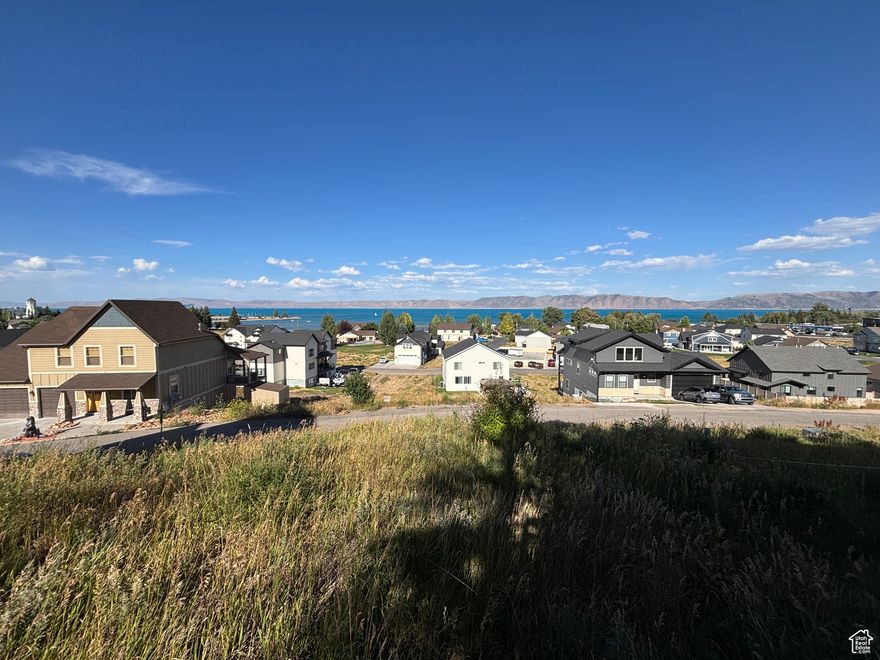 Beautiful Bear Lake building lot in the Lochwood subdivision, in the heart of Garden City. SHORT TERM RENTALS ALLOWED! Top row of the community, giving you beautiful Bear Lake views. Lochwood amenities include outdoor pool and hot tub, club house with workout room and game area, playground, snow removal, front yard and road maintenance, and water usage included. Perfect spot for your dream home, vacation get-a-way, or a high-yielding investment property. Paved roads with easy year-round access. Sits only 1 minute from the expanding marina, Garden City bike paths, new grocery and hardware stores, and close to restaurants and shopping! Utilities stubbed. Call today before it's gone! Nearby lot also available (lots 87 and 85 available).