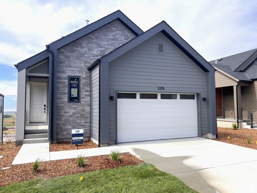 Now Available! This highly desirable Skyridge II Walkout offers main floor living featuring stunning interior features including a covered balcony overlooking the Wasatch mountain range.  The main floor is equipped with a chef's kitchen including Kitchen Aid appliances and a waterfall kitchen island, a tile surround fireplace. The sliding doors in the Owner's suite open to the covered balcony and the Owner's bath is complete with a luxurious walk in shower and walk in shower.  Downstairs in the finished basement you will find 2 additional bedrooms and bathrooms, along with a kitchenette fitted with a microwave, beverage fridge and sink.  Please call or email listing agent for more information on how to submit an offer.  Use PulteMortgage, our preferred lender, and receive up to 3% toward closing costs and/or rate buy down with rates as low as 5.25% on a 30 year fixed conventional loan for qualified buyers.  Buyer to verify square footage. No representation or warranties are made regarding school districts and assignments; please conduct your own investigation regarding current/future school boundaries. Sales Center Hours: Open Monday-Saturday from 10:00AM - 6:00PM.