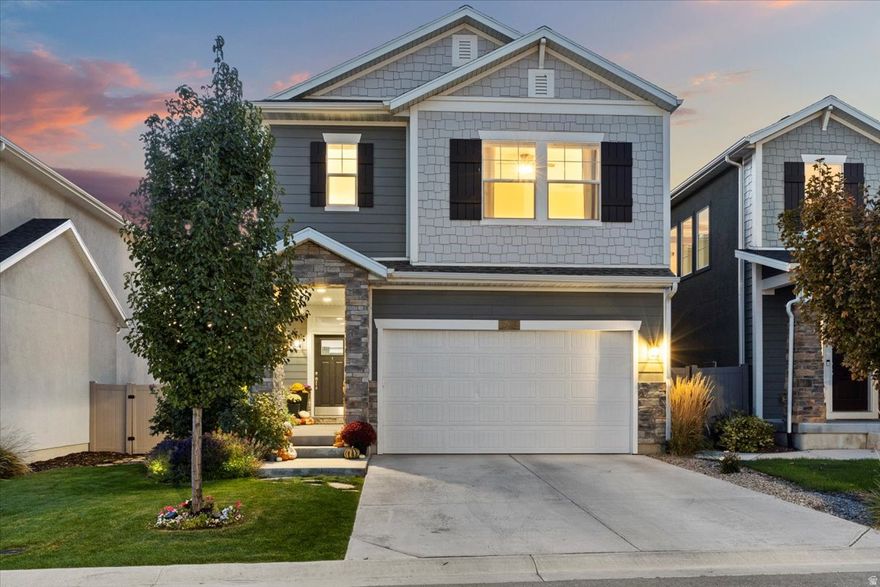 Less than a block from the 64-acre Wheadon Farm Park. Nestled in a prime Draper location, within ten minutes of three dual-immersion schools offering French, Spanish, and Chinese, with quick access to I-15. This lovely recently-built home boasts mountain views from the primary bedroom and bathroom, nine-foot ceilings and large windows that provide natural light throughout all three levels. A freshly finished basement includes a wet bar and thoughtful use of every space. The private backyard comes with custom raised garden boxes, berry bushes, and a patio with string lights, perfect for entertaining.