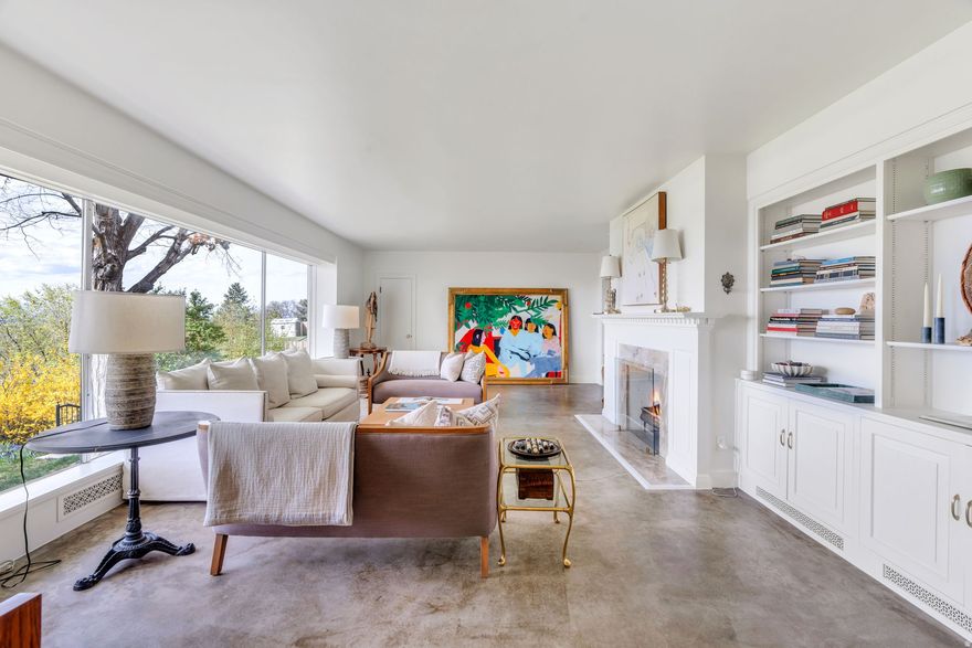 One-of-a-kind Oak Hills property offering spectacular, unobstructed views of Utah Valley, Utah Lake, and Rock Canyon. This rare home comes on the market once in a lifetime and is ideally situated on a large corner lot with a flat driveway and usable yard. Fully remodeled with high-end designer finishes, the home features custom solid wood inset cabinetry, new Pella wood-clad/aluminum windows, fresh Benjamin Moore Scuff-X paint, Emtek hardware, suspended slab concrete subfloors, and commercial-quality construction throughout. Enjoy a curb-less entry from the two-car garage for added convenience. The fully fenced yard is a true retreat with mature landscaping, fruit trees (peach, plum, pear, apricot), an herb garden, large garden beds, blackberry bushes, and a chicken coop. Walking distance to Rock Canyon Trailhead, Rock Canyon Park, and Rock Canyon Temple, this property offers unmatched location, craftsmanship, and lifestyle.