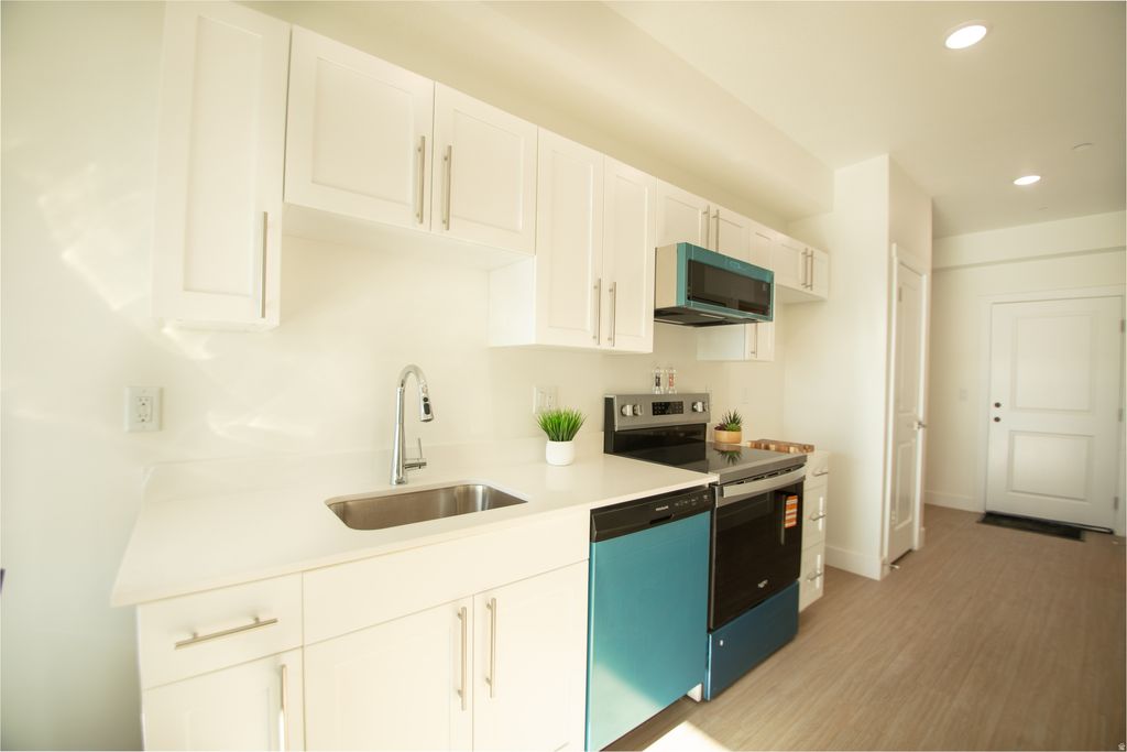 Photo of 2085 N N. MAIN ST ST #402, Sunset, UT 84015 (MLS # 2144096)