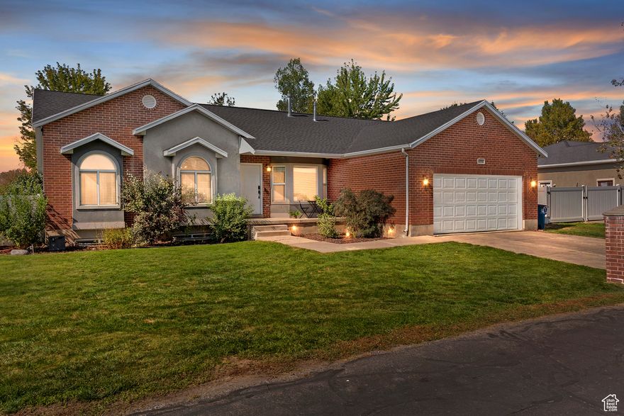 Located on a cozy, private cul-de-sac, this attractive ranch home sits on a nearly half-acre lot complete with fruit trees, full vegetable and berry garden, and darling large-capacity chicken coop. The extra large gate allows sizable vehicles to come and go from the back yard with ease. Boasting six bedrooms and four full bathrooms, a formal living room, two family rooms, two pantries, and two storage rooms, this home beckons with ample space and accommodations. You'll find numerous walkable amenities including green space, trails, playgrounds, pickle ball courts, bike parks, and Deseret Drive businesses. Minutes to the freeway, Davis Golf Course, Davis High, Cherry Hill, shopping, and dining. Your country living dreams have finally come true!