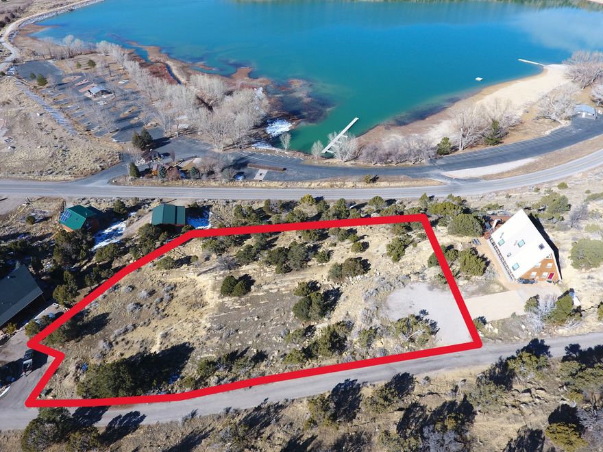 Beautiful 1.03-acre lot ready to build on in Sterling, Utah, right next to Palisade Lake and Palisade State Park Golf Course. This property sits on a cliff above the lake with amazing views all around and a very peaceful setting. Tons of wildlife in the area and plenty of room to enjoy nature. Fishing, hiking, golfing, and endless outdoor adventures are right out your door with Palisade State Park just steps away. A really special spot to build a home or cabin and enjoy the scenery, quiet, and outdoor lifestyle every day.    Septic tank installed.