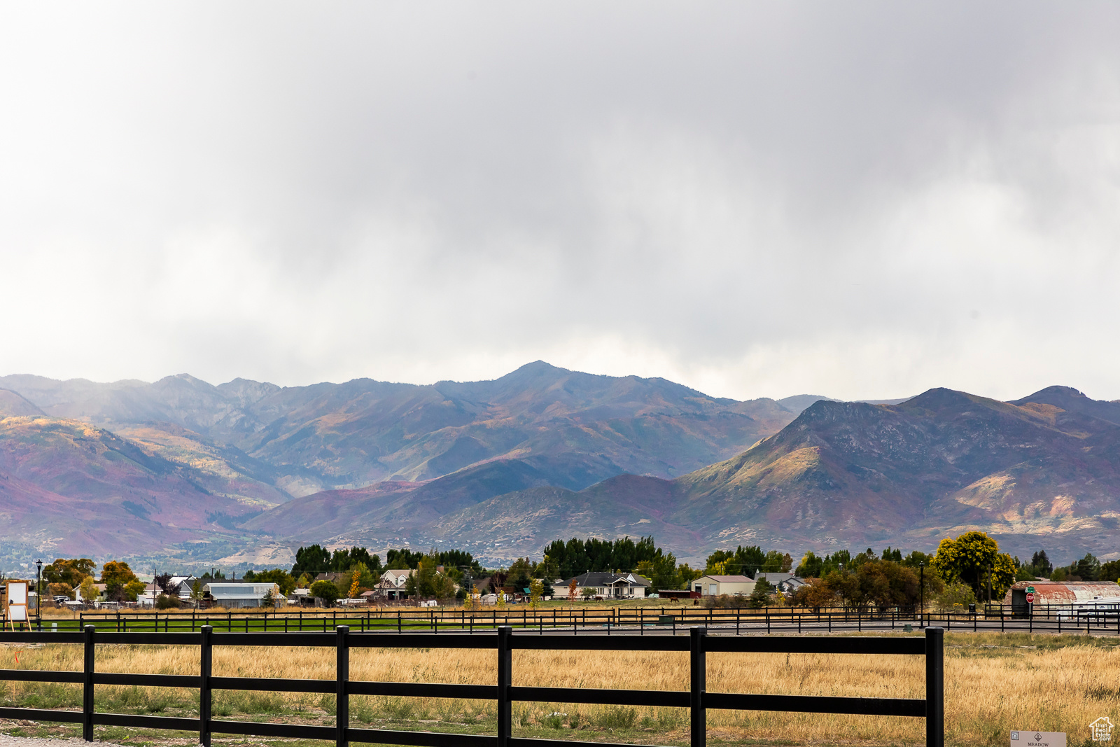 Prime 1-acre lot located in the highly desirable Meadow Views Subdivision. This lot offers incredible valley and mountain views and is positioned perfectly to capture the best of the surrounding scenery. All utilities are available, and the property is fully irrigated, making it truly ready to build. Enjoy the peace and privacy of country living with the convenience of nearby amenities. Meadow Views is a well-planned subdivision known for its quality homes, open space, and beautiful setting.