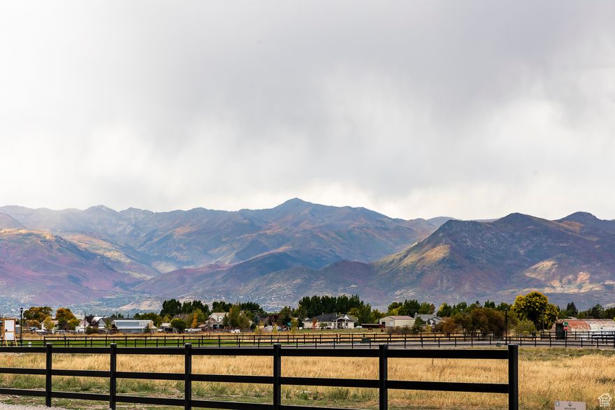Prime 1-acre lot located in the highly desirable Meadow Views Subdivision. This lot offers incredible valley and mountain views and is positioned perfectly to capture the best of the surrounding scenery. All utilities are available, and the property is fully irrigated, making it truly ready to build. Enjoy the peace and privacy of country living with the convenience of nearby amenities. Meadow Views is a well-planned subdivision known for its quality homes, open space, and beautiful setting.