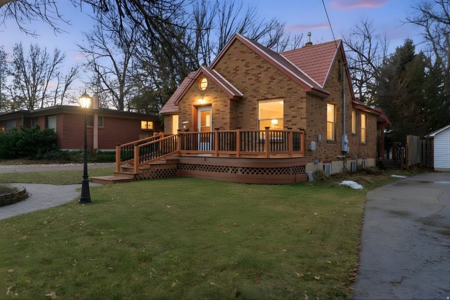 This charming bungalow-style home is full of character and warmth, offering the perfect blend of cozy cottage appeal and modern updates. Featuring new windows and beautifully updated countertops, the home feels bright, inviting, and move-in ready. The exterior is just as appealing, with mature trees providing shade and privacy, and Trex decking on the patios creating ideal spaces for relaxing or entertaining outdoors. Conveniently located close to schools, churches, and everyday amenities, this home offers comfort, charm, and convenience in a highly desirable location.