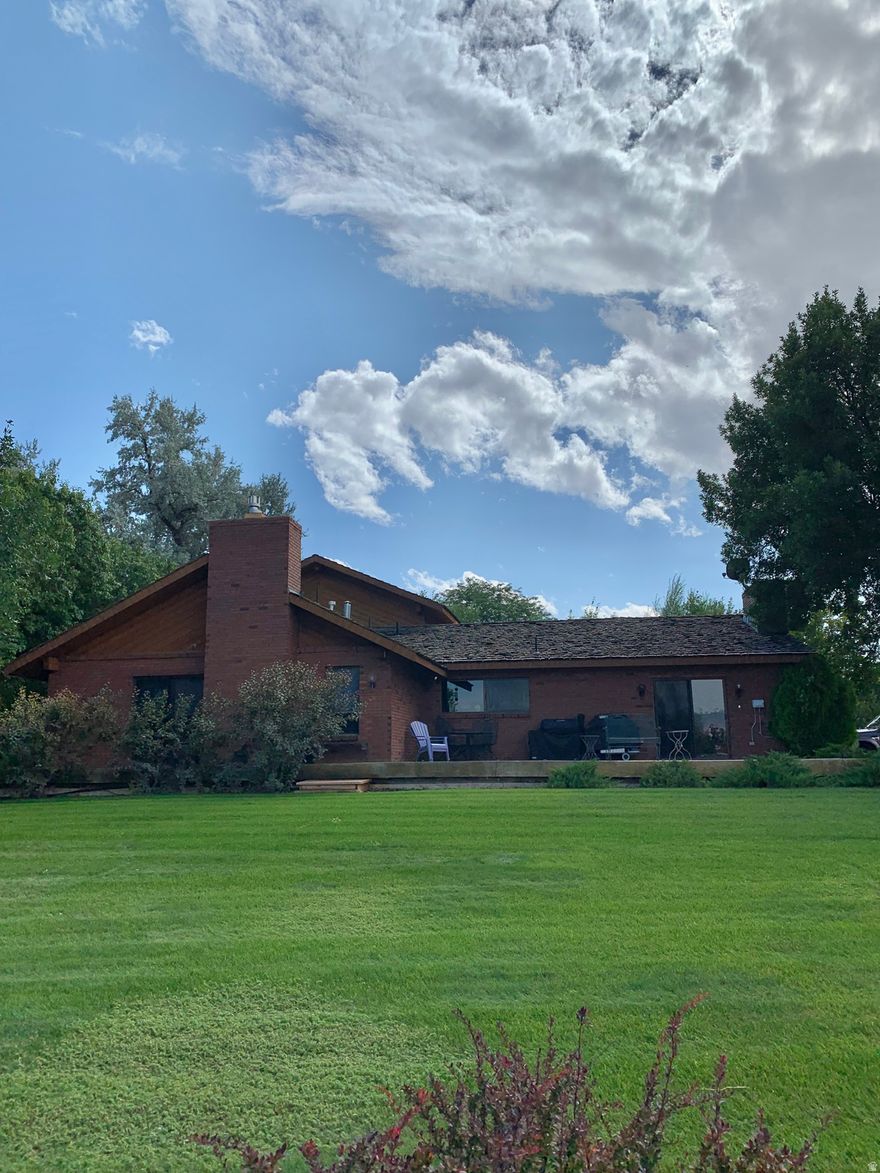 Are you looking for a unique one of a kind property?  Look  no further! Beautiful secluded location on 5.19 acres in Maeser!  Includes tax id #0024; 0027; 0028; 0042 and 0043. Property has piped fencing with brick pillars.  Yard is on a well system and includes a spacious tree house. 1400 square foot shed/shop with electricity - water shares includes 3 Shares Ashley Valley Reservoir; 15/80 Ashley Central Primary; 3 Shares Ashley Central "S" stock and 5/20 Shares Ashley Central stock.  The home is custom and unique - tons of built-ins and character throughout. 2 basketball bankers are included.  There is awesome storage both inside and out.  Everything in garage with the exception of attached cabinetry is excluded.  Seatainer in yard is excluded.  Buyer to verify all information taken from County Records.