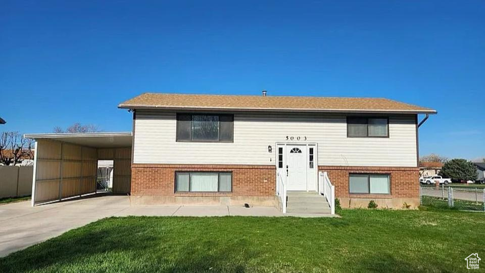 Versatile Split-Level Home with Dual Living Spaces, Modern Upgrades, and Rental Potential Welcome to this beautifully maintained 3-bedroom, 2 three-quarter bath split-level home offering a flexible layout with two full kitchens, two spacious family rooms, a private basement-level entry, and a prime location. This unique property is perfect for multigenerational living, a rental opportunity, or a smart investment. The upper level features two bright bedrooms, a three-quarter bath, a welcoming family room, and a well-appointed kitchen. The lower level includes a large primary bedroom with generous closet space, a second three-quarter bath, another family room, a second full kitchen, and a dedicated laundry room-creating the perfect setup for a private in-law suite or tenant space. Recent upgrades and highlights include: Brand-new windows throughout for natural light and energy efficiency (1 year old) New furnace (1 year old) for reliable comfort Upgraded lighting fixtures for a modern feel Roof shingles replaced 57 years ago Screened-in upper patio for year-round enjoyment Ground-level patio ideal for barbecuing and entertaining Fully fenced backyard for pets and privacy Storage shed for tools and equipment Covered carport for convenient parking Private basement entry to create two separate residences Laundry room for added functionality All stainless steel appliances in both kitchens INCLUDED Washer and dryer INCLUDED in sale Location perks: Just 10 minutes from freeway access and multiple shopping centers and only 20 minutes from Weber State University, this home is ideally located for both convenience and investment potential. This property's flexible split-level design and dual-living layout make it a rare opportunity for families seeking extra space or investors looking to maximize rental income.