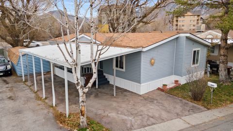 Photo of 4967 S LA CONTESSA DR E #A029, Salt Lake City, UT 84117 (MLS # 2128394)