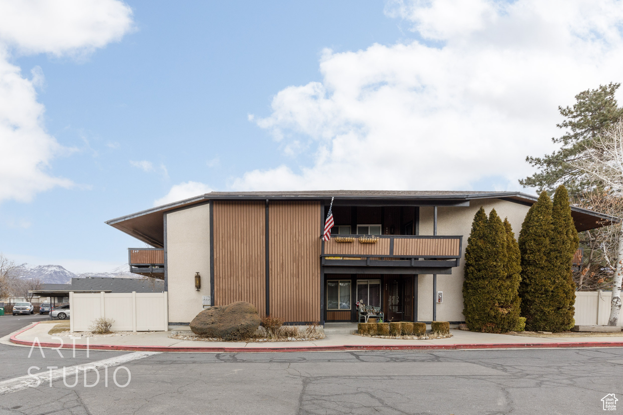 EXCELLENT CENTRAL OREM LOCATION! Garden Park is in a convenient central location right off of Center Street in Orem within walking distance to shopping, restaurants, and entertainment. This location boasts several features which set this specific unit apart. The living room has French Doors which lead out to one of the largest fully fenced private patios in the entire complex. There is newer Travertine flooring and the entire interior has been freshly repainted. Needs new carpeting in the bedrooms, and the list price reflects this known cost concession. Huge Primary Bedroom with walk-in closet. This unit also has a unique interior spiral staircase which leads down to a basement with a cozy flex space/family room, and a very large separate storage room with built in shelving. The basement also has a separate exterior entrance so there is easy entry or exit on both levels in case of emergency. There is a heated community swimming pool along with a clubhouse just a few steps away, and RV parking is also  available.