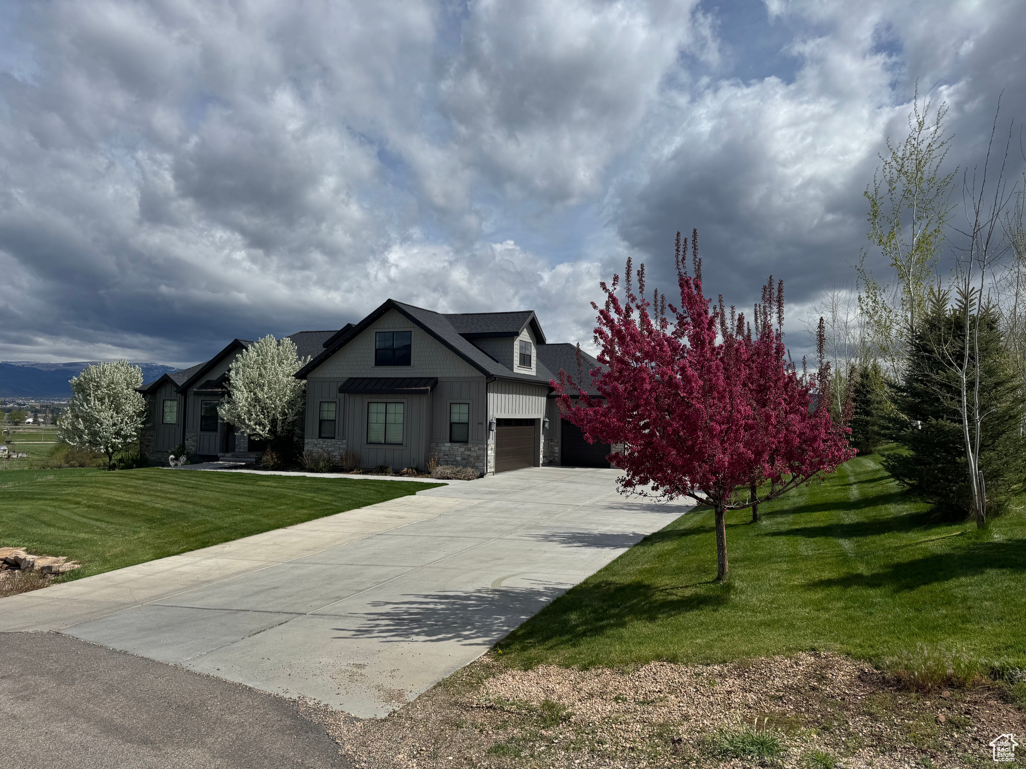 Country living at its "finest"!!! The location of this custom home is in one of the most coveted areas in Utah. This location is very private, with elevated views that are "priceless". Views of Mount Timpanogos is out the back, and overlooking the 'Swiss' town of Midway out the front, and the Heber Valley towards the east. Home sits on a fully landscaped, pristine, 1.17 acre lot on the West bench of Midway. There is room for a barn, or other outbuildings, and or a possible guest-home if desired. There is NO HOA!!!!! This property is horse property, and livestock is allowed. Property is very close to Wasatch State Park with miles of trails out the front door. There's plenty of extra parking in addition to the oversized 3 car garage. Home has timber-framed back and front porches. The home has an extra large party-deck off of the kitchen to entertain guests. A cozy, but large family room is open to the kitchen, and is accented by a beautiful fireplace and extra tall windows overlooking the Heber Valley, and down toward Deer Creek Reservoir. The kitchen is a custom gourmet kitchen with stunning cabinetry, quartz counter-tops, double-oven, extra large stainless refrigerator, and oversized granite island. All main level interior doors are oversized. Home has a custom cathedral ceiling in the family room. A bonus/activity room upstairs with potential for a bunkroom. Many many extras to mention about this home & property. Every inch of the home is custom, and was built by an award winning custom home builder in Utah. Home was built in 2017. This property is close to Soldier Hollow golf course, and a couple of miles north of Deer Creek Reservoir. The property is minutes within 4 major ski resorts, and less than an hour from Salt Lake International Airport. 3 other golf courses are minutes away, and also the Blue Ribbon Provo River is 5 minutes away.