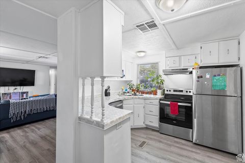 Tiny photo for 2875 N HILL FIELD RD #17, Layton, UT 84041 (MLS # 2120753)