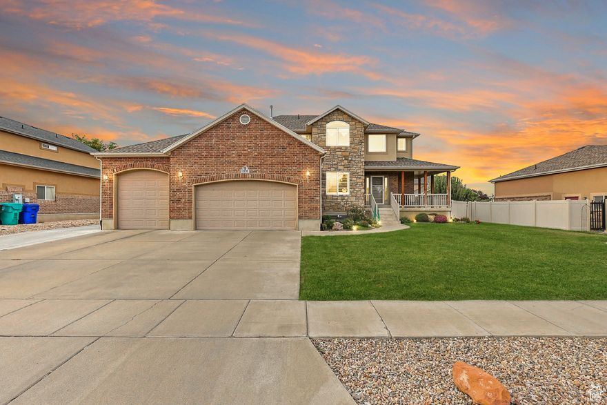 Magnificent Two-Story Home with Finished Basement, RV Parking, and Full In-Law Suite/basement ADU! Located in an extremely desirable area with walking distance to schools, this sensational residence enchants with a beautiful covered front porch, stunning exterior stone accents, and overflowing curb appeal. Explore the immaculate interior to discover an openly flowing layout, arched doorways, plantation shutters, stylish color scheme, home office/flex room, and an expansive living room with a gas fireplace. Entertain in the adjoining chef-inspired kitchen, which has smooth Corian countertops, wood cabinetry, contemporary tile backsplash, breakfast bar island with wrap-around bar seating, recessed lighting, and sizable walk-in pantry. Ideal for relaxation, the upper-level primary bedroom impresses with a huge walk-in closet and a spa-like en suite boasting dual sinks, jetted tub, and separate shower. Three additional bedrooms (one with a walk-in closet) and a full bathroom complete the upper-level, while the finished basement affords multigenerational versatility with a mother-in-law suite/ADU featuring a bedroom, guest bathroom, full kitchen, recreation room, separate laundry connections and a private entrance. Enjoy the entertainment possibilities of the fenced-in backyard with a covered patio and sprawling greenspace. Easily walk to elementary school, the senior center, library, and Rush Fun Center! Also near shopping, restaurants, multiple gyms, schools, golf, and so much more! Additional considerations are the attached 3.5+car tandem garage with extra-high garage door, 40' RV parking, second-floor laundry room, cold storage, privacy fence, NEWER appliances (2024), NEWER floors and carpet (2023)! Schedule your private tour today! Square footage figures are provided as a courtesy estimate only and were obtained from tax records.  Buyer is advised to obtain an independent measurement.