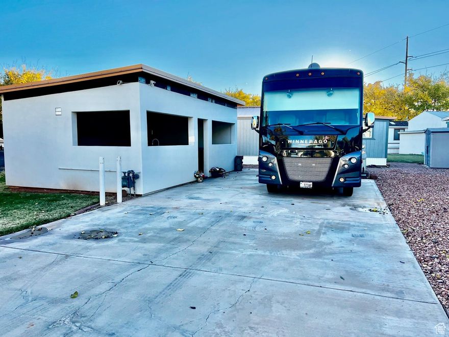 Take a look at this property. It is a one of a kind. The lot is extremely large to accommodate your big RV. Behold the OUTDOOR KITCHEN. Enjoy the Comfy Furniture, watch football, and feast on your delicious food that you have prepared. There is a 5 Burner Barbecue, 2 Burner Broiler, and a large Grill. You can accommodate a lot of guest/family easily. Don't miss out. 55+ Community.  Buyer to verify all information