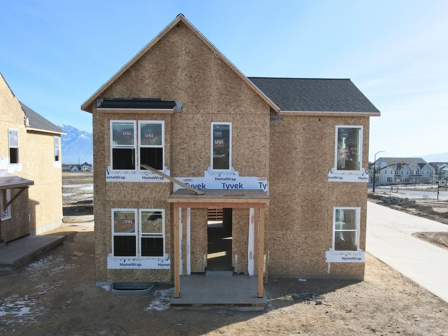 Brand new home with a FINISHED basement and beautiful designer upgrades throughout, including an upgraded gourmet kitchen with quartz countertops, upgraded cabinetry, 9-foot ceilings on all levels, fireplace, modern railings, and more. This popular Innovator floor plan features a spacious great room open to the dining area and kitchen, plus a main-level office, perfect for working from home. The primary suite offers a large walk-in closet and a spa-like en-suite bathroom with a separate stand-alone tub and shower. Situated on an alleyway corner lot, the home includes full landscaping, along with many additional features already included. Estimated Summer 2026 Completion *Interior finished photos are of previously built home of same plan for example purposes. Upgrades and finishes will vary*