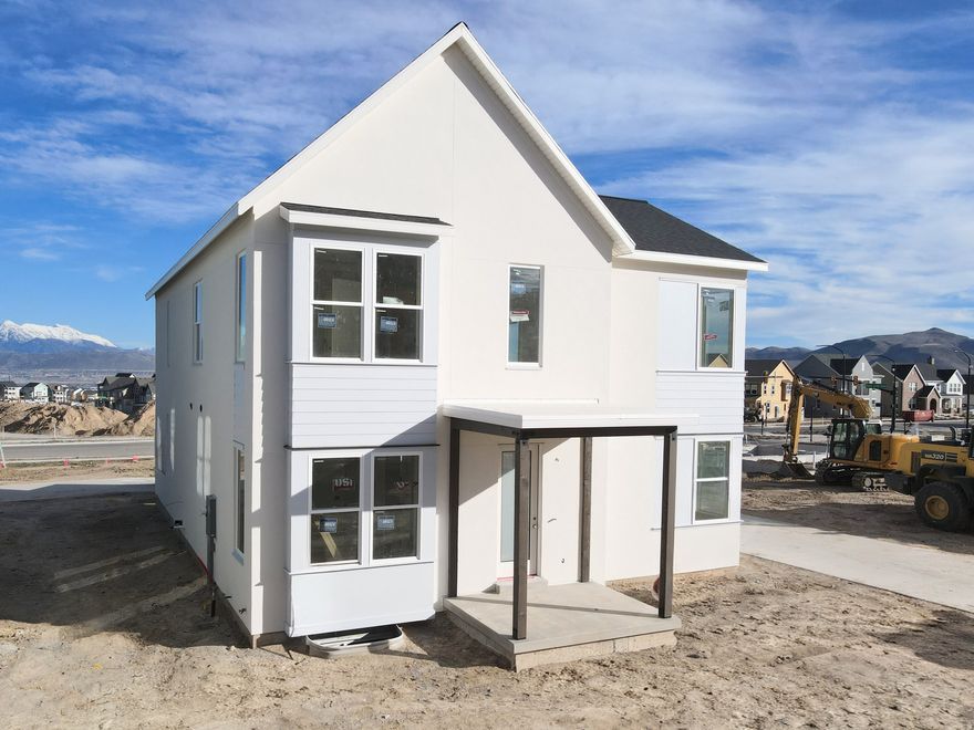 Brand new home with a FINISHED basement and beautiful designer upgrades throughout, including an upgraded gourmet kitchen with quartz countertops, upgraded cabinetry, 9-foot ceilings on all levels, fireplace, modern railings, and more. This popular Innovator floor plan features a spacious great room open to the dining area and kitchen, plus a main-level office, perfect for working from home. The primary suite offers a large walk-in closet and a spa-like en-suite bathroom with a separate stand-alone tub and shower. Situated on an alleyway corner lot, the home includes full landscaping, along with many additional features already included. Estimated May-June 2026 Completion *Interior finished photos are of previously built home of same plan for example purposes. Upgrades and finishes will vary*