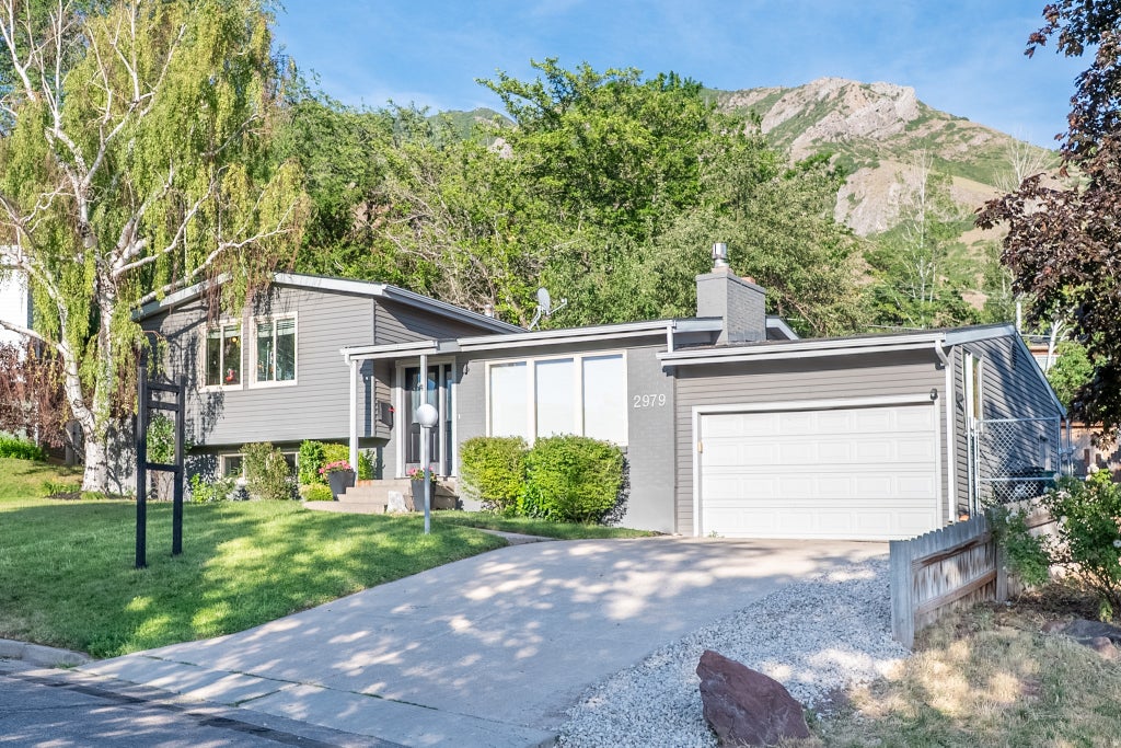 Photo of 2979 S WARR RD E, Millcreek, UT 84109 (MLS # 2166102)
