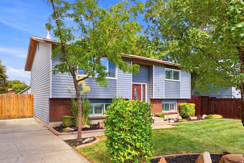 Photo of 5130 W WILDROSE DR S, West Valley City, UT 84120 (MLS # 2186451)