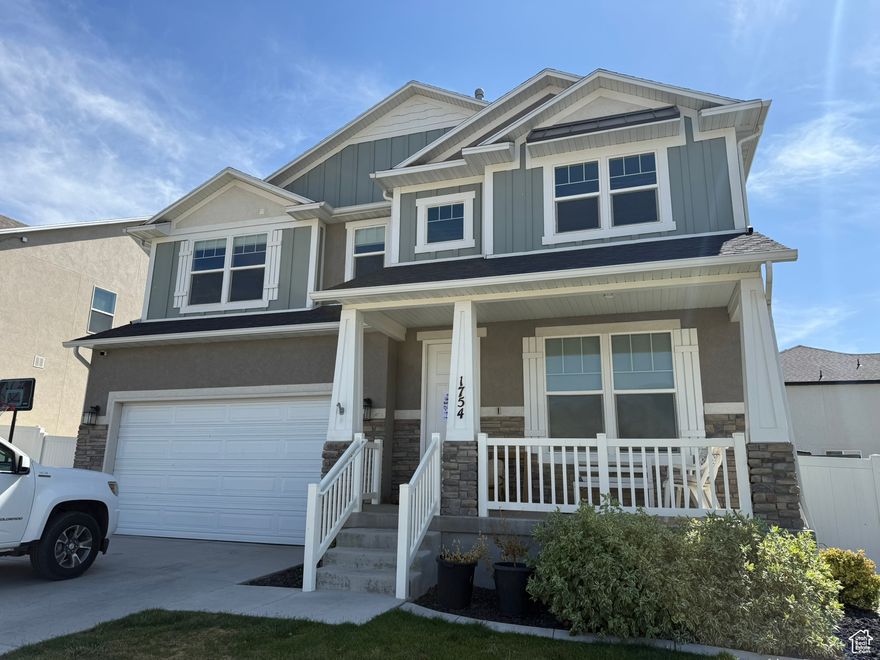Gorgeous home in the heart of Spanish Fork! This modern 4-bed, 2.5-bath residence is minutes from shopping, dining, schools, and I-15. Enjoy a spacious open kitchen and family room designed for gatherings. The primary suite features a generous walk-in closet and private bath. Relax or entertain on the expansive deck, perfect for barbecues and outdoor furniture, overlooking a fully fenced yard with auto sprinklers. Includes a roomy 2-car garage. Move-in ready! Buyer to verify listing information and square footage.