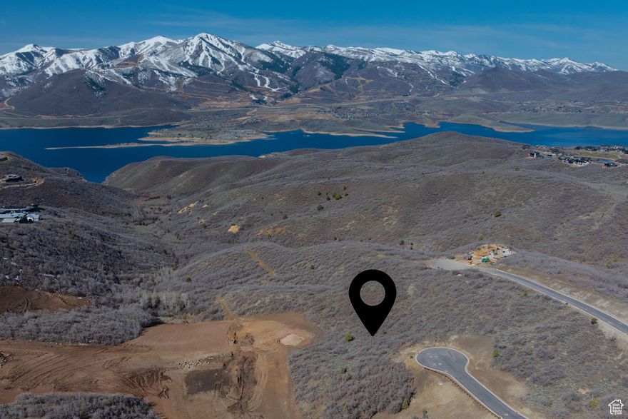 Tucked in a cul-de-sac near Tuhaye's new private entrance, this is a lot you will not want to miss.  Due to it's unique topography, the large Southwest facing  building envelope offers nearly unencumbered views of Mt. Timpanogos, Deer Valley Resort's new East Village and the Jordanelle Resevoir.  Builders have called this lot a very easy lot to build with a rare level drive and perfect slope for a walkout lower level.  This is a very private lot with easy access to the front gate, clubhouse and Tuhaye amenities.  Talisker Membership available. For additional information on Tuhaye and all Talisker Club amenities, please visitTaliskerclub.com