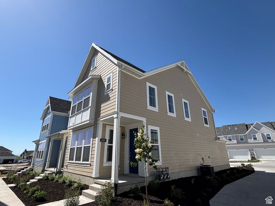 This brand new, gorgeous home has 3 bedrooms, 2.5 bathrooms and a 2 Car Garage. It is an end unit home on a corner lot. All in a community that is unmatched with parks, sports courts, pools, and more! It has upgraded Quartz countertops throughout including undermount sinks. It also has beautiful 42" cabinetry with crown molding. The home includes stainless steel appliances and a gas range. The upgraded faucets in the home are gorgeous. The open floorplan is welcoming and comfortable. It has a large owner's suite & walk-in closet. There is a covered porch to sit and relax on a nice day. The Daybreak community is in a very desirable location in South Jordan not far from all the everyday conveniences.