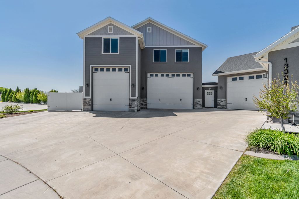 Photo of 13324 S HERITAGE FARMS CV W #124, Riverton, UT 84065 (MLS # 2159479)