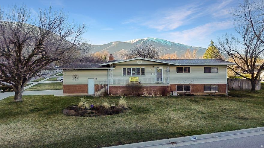 Welcome home to your peaceful retreat!  This amazing home is located on a large corner lot and has a private fenced in backyard with a very nice covered patio.   You are going to fall in love with the updated kitchen, and large rooms.  There is tons of storage in this home!   The living room is large and has a fireplace.  The basement living area has a woodburning stove that is vented through the fireplace which was bricked over.   This home has been very well taken care of and is just waiting for a new owner.