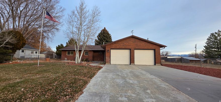 Beautiful 3 bed 2 bath home on .25 acre with attached 2 car garage, mature trees, with a huge pine in the back yard.