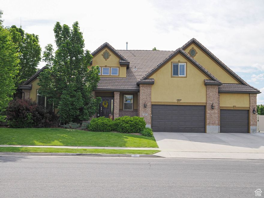 Recently Remodeled Interior Paint, Flooring & Lighting!!  Excellent Neighborhood with Huge Park just a Couple of homes away / Grand Entry with 18-foot ceilings / Formal Dining & Living Rooms / Large Master Suite with Dual sinks, Garden Tub, Large Shower and Walk-in Closet / Kitchen has High Ceilings, Large Bar & Kitchen Dining / Great Room with Fireplace / Awesome Back Yard and Deck that Faces East for Perfect Dining & Entertaining / Downstairs has Family Room - Theater Area / Ping Pong- Pool Table Area / Kitchen Down for Extra Entertaing & Living Possibilities / Large Loft & Playroom Upstairs / Over sized Garage with extra Storage. This home is a Must-See!!