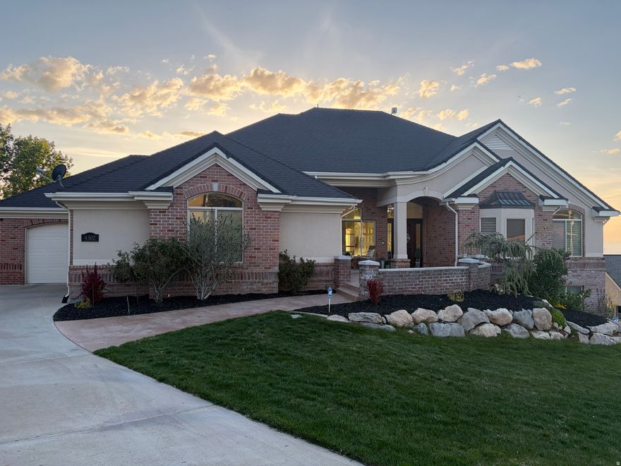 From the moment you walk through the front door, you're met with breathtaking valley and lake views. Truly one of the best views along the Wasatch Front, framed by the expansive windows that fill the home with natural light. The home features an open concept up and down. The main floor features rich Australian Oak hardwood floors, elegant tile, and beautiful granite countertops, adding warms and timeless style throughout. This home is designed for both everyday living and entertaining. The basement also features a full kitchen, heated gym area, and a walkout basement to the pool and patio where you can make lifetime memories. This home is ideally located to SLC, airports, and world class golf courses. This is an exceptional opportunity to own a carefully planned and beautiful masterpiece.   Square footage figures are provided as a courtesy estimate only and were obtained from Previous Listing.  Buyer is advised to obtain an independent measurement.