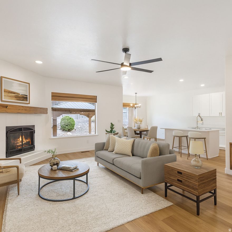 Welcome to Your Next Home on the Border of Eagle Mountain & Saratoga Springs! Perfectly situated to enjoy the best of both cities, this beautifully updated home offers the perfect blend of comfort, privacy, and future potential. With no backyard neighbors and an additional .14-acre lot directly behind the property available for purchase from the city (quoted at $3$4 per sq. ft.), you'll enjoy open views today and the option to expand your property tomorrow. Step inside to discover a freshly remodeled interior featuring sleek quartz countertops, brand-new flooring throughout, Shaker style cabinets, and a full interior repaint. The spacious gathering rooms and open-concept layout create a warm, inviting atmosphere-perfect for hosting guests or simply relaxing at home. This property also includes thoughtful upgrades designed for comfort and efficiency - Radon mitigation system, Reverse osmosis system, Separate furnaces for each level, ManaBloc centralized water control system, & Water softener.  Outside, you'll find a dedicated RV pad providing extra parking or storage for outdoor gear and toys. With modern finishes, smart home systems, room to grow, and a prime location, this home truly checks all the boxes. Schedule your showing today-this one is a must-see! **