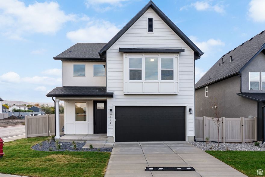 Welcome to theAUDREY - Woods Cross's premier single-family home community blending timeless design with modern living. Lot 15 features the Swiss 3  Cottage Elevation, offering 4 bedrooms, 2.5 bathrooms, and 2,339 sq ft of thoughtfully designed space. The main level showcases open-concept living with abundant natural light, while the upper level includes a spacious primary suite and three additional bedrooms.  This quick move-in home offers a two-car garage and an inviting neighborhood atmosphere with HOA services covering common area landscaping, snow removal, and private road maintenance.  Located just minutes from downtown Salt Lake City, major commuter routes, and top-rated Davis County schools, theAUDREY combines convenience, craftsmanship, and community in an exceptional northern Utah setting.