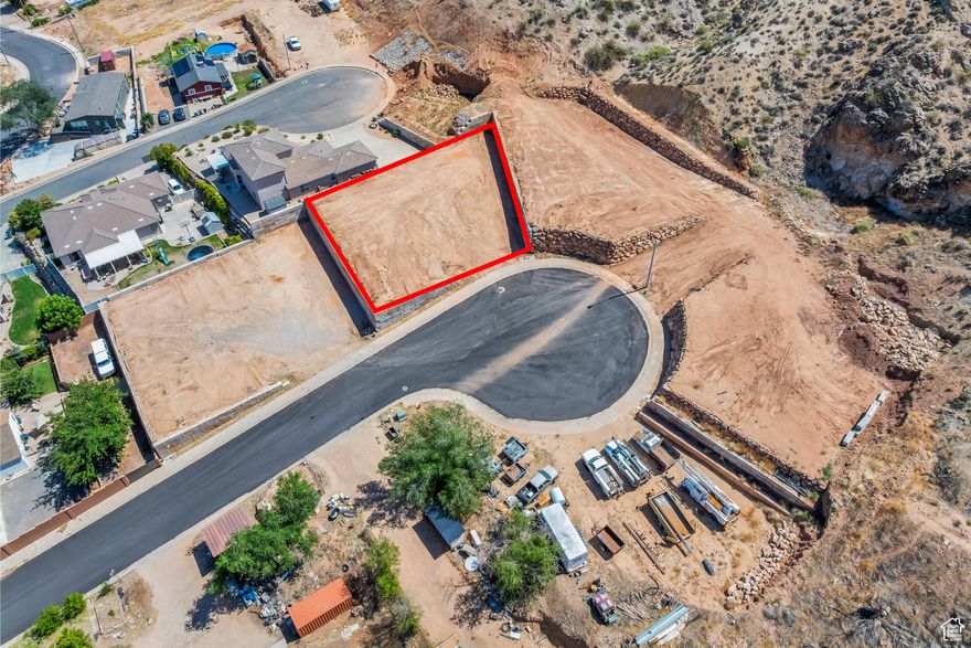 This 0.23-acre lot is part of four contiguous parcels, offering endless potential. It's the perfect place to build your dream home, surrounded by peaceful desert landscapes and breathtaking views. You also have the option to add an income-producing accessory dwelling unit (ADU) for extra space or rental potential. For builders and developers, this property presents a strong investment opportunity with multiple development possibilities. With no HOA and the flexibility to bring your own builder, you'll enjoy maximum control over your project. Located close to Zion National Park, Sand Hollow, Warner Valley, sand dunes, and world-class outdoor recreation, this is a prime location to create something truly special. Buyer/buyer agent is responsible for verifying all information.